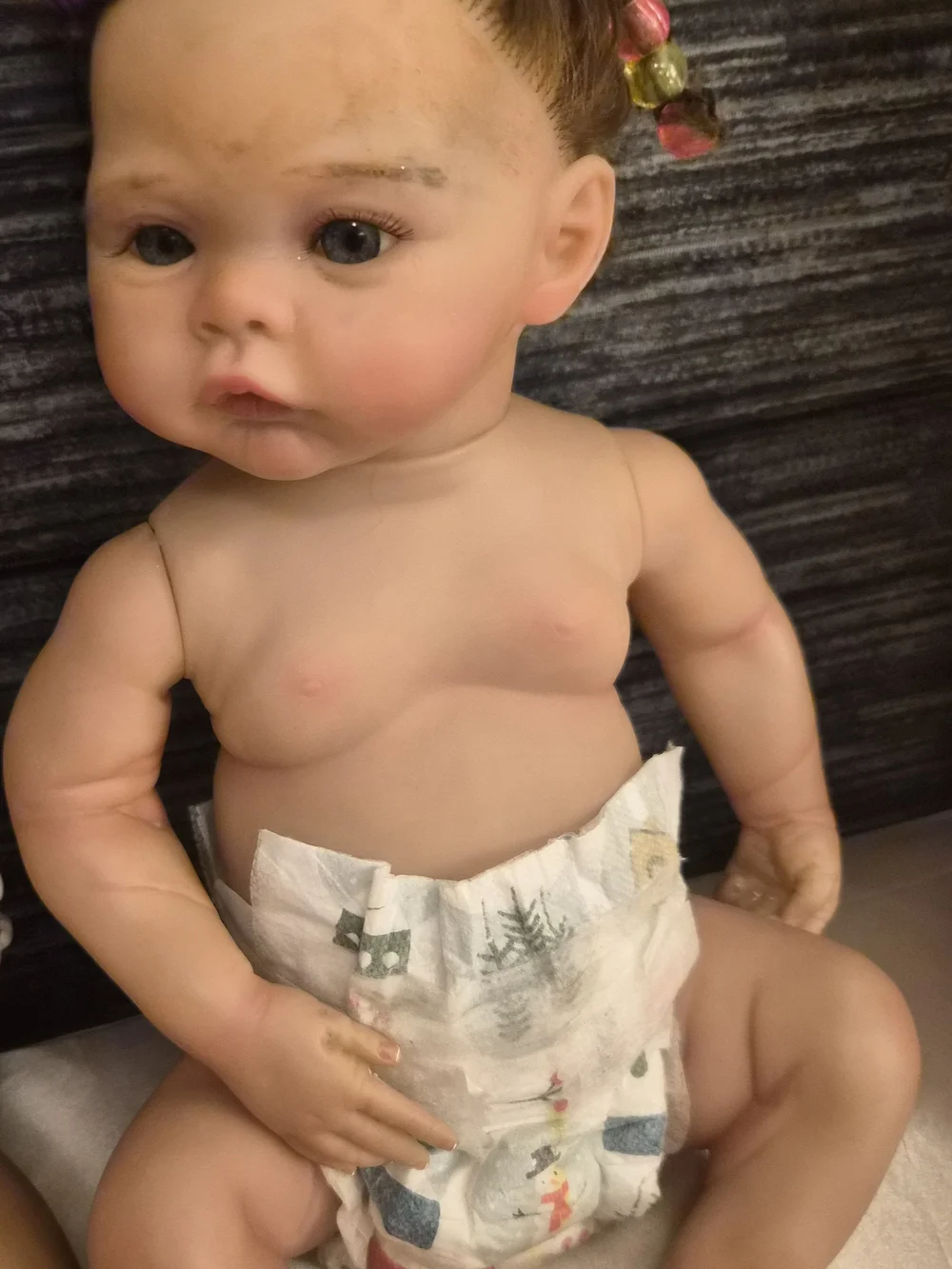 Reborn Baby Doll with Brown Hair and Pink Hair Beads